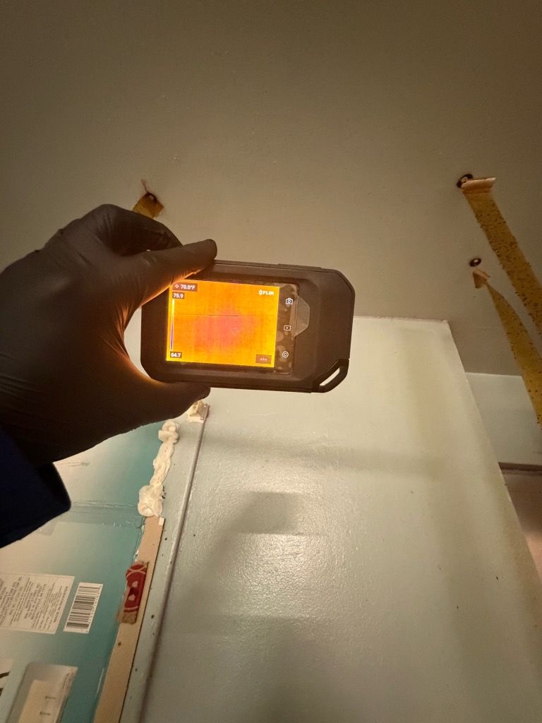 Thermal camera reading moisture behind a wall